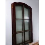 AN EDWARDIAN FOUR FOLD GLAZED SCREEN.