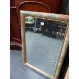 A MODERN DECORATIVE FRAMED MIRROR.