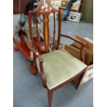 AN ART NOUVEAU MAHOGANY AND INLAID ARMCHAIR.