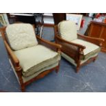 A WALNUT FRAMED THREE PIECE BERGERE SUITE.