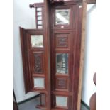 A VICTORIAN MAHOGANY FRAMED MULTI PANED MIRROR.