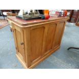 A LATE VICTORIAN PINE PEDESTAL CABINET.