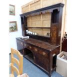 A GEORGIAN COUNTRY OAK DRESSER.