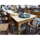 A LARGE ANTIQUE PINE KITCHEN TABLE.