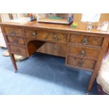 A BURR WALNUT DRESSING TABLE.