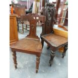 TWO VICTORIAN OAK HALL CHAIRS.