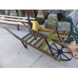 A WOODEN GARDEN BARROW.