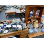 A LARGE QTY OF TABLE LAMPS, BLUE AND WHITE POTTERY,ETC.