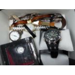 A BOX OF WATCHES.
