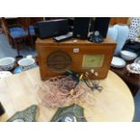 A VINTAGE RADIO AND A SURROUND SOUND SYSTEM
