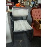 A SET OF FOUR RETRO CHAIRS.