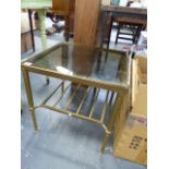 A BRASS FRAMED COFFEE TABLE.