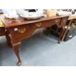 A MAHOGANY WRITING TABLE.