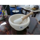 A PESTLE AND MORTAR.
