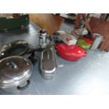 A QTY OF COOKING PANS.