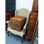 AN EDWARDIAN INLAID WING BACK ARMCHAIR.