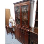 A GLAZED BOOKCASE CABINET.