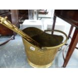 A BRASS COMPANION SET AND A COAL BUCKET.