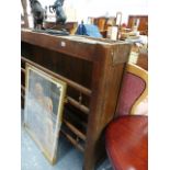 A WALNUT DRESSER RACK.