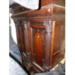 A LARGE CONTINENTAL OAK CABINET.