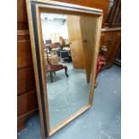 A LARGE BEVEL EDGE MIRROR.