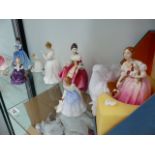 NINE ROYAL DOULTON FIGURINES.