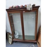 A GLAZED MAHOGANY CABINET.