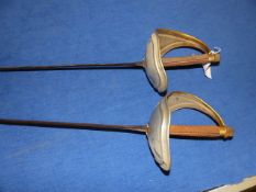 A PAIR OF FENCING SWORDS.