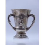 AN EDWARDIAN SILVER THREE HANDLED CELTIC DESIGINED LARGE LOVING CUP, DATED 1911 LONDON, POSSIBLY FOR