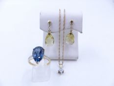 A 10ct YELLOW GOLD DIAMOND PENDANT, A PAIR OF 9ct GOLD CHECKERBOARD PEAR CUT GEMSTONE EARRINGS AND A