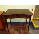 A PAIR OF GILLOWS MAHOGANY INVERTED BOW FRONT TWO DRAWER SIDE TABLES WITH SQUARE TAPERED LEGS. W.100