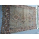 AN ANTIQUE PERSIAN SHIRAZ RUG. 184 x 144cms AND TWO SMALLER EXAMPLES. (3)