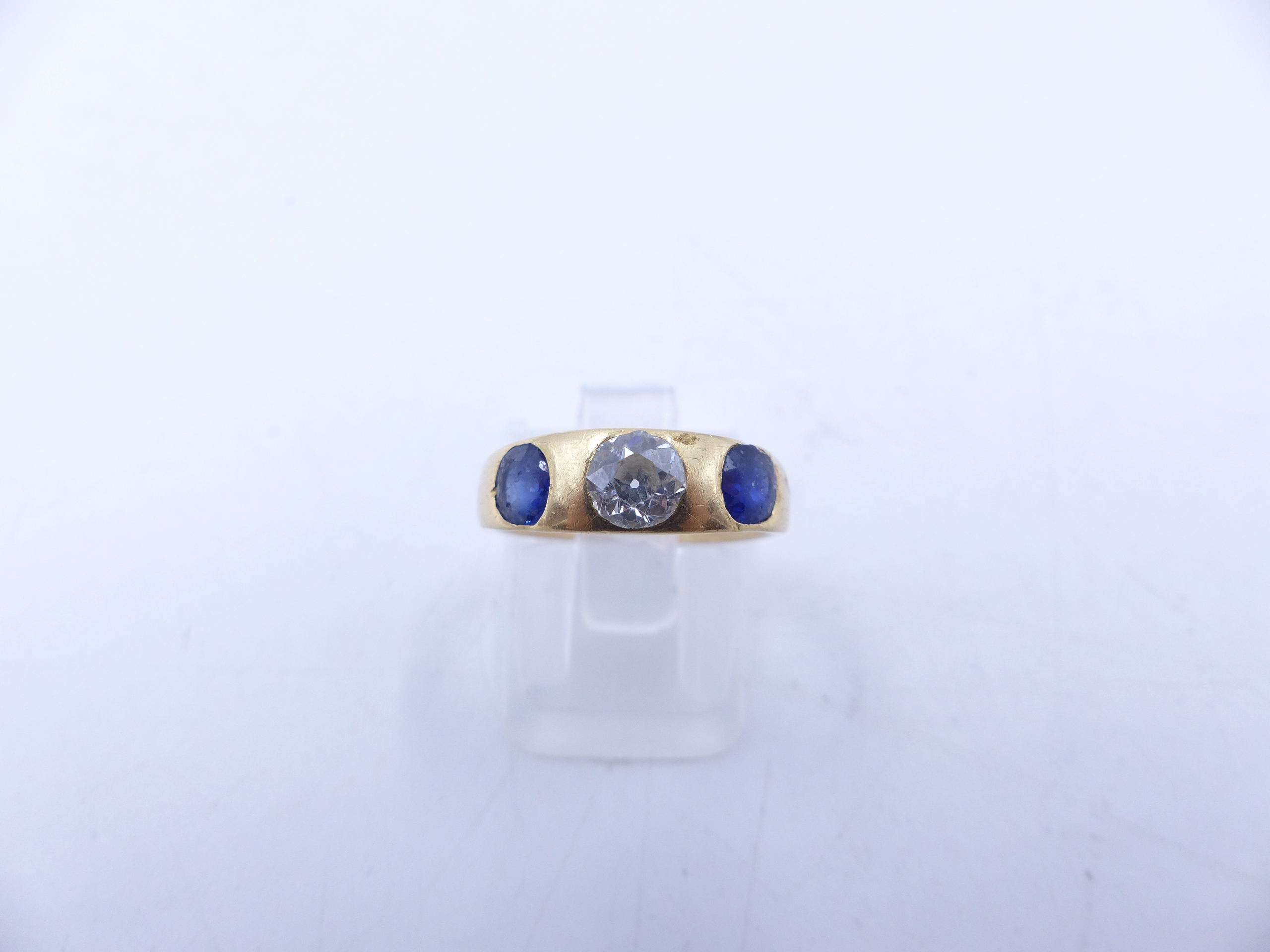 AN 18 STAMPED YELLOW GOLD SAPPHIRE AND DIAMOND THREE STONE TRADITIONAL GYPSY-SET RING. THE CENTRE - Image 5 of 9