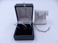 A SELECTION OF 9ct WHITE GOLD DIAMOND SET JEWELLERY TO INCLUDE A DIAMOND BRACELET, DIAMOND HOOPS AND