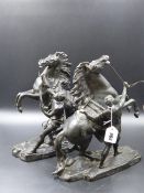 A PAIR OF LATE 19th./EARLY 20th.C. MARLEY HORSE FIGURES OF REARING STALLIONS ON PLINTH BASES. H.