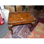 A SMALL WALNUT TRAY TOP COFFEE TABLE WITH CARVED CABRIOLE LEGS. W.60 x H.45 x D.45cms.