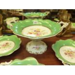 A VICTORIAN APPLE GREEN PART DESSERT SERVICE, THE CENTRE RESERVES PAINTED WITH SPRAYS OF WILD
