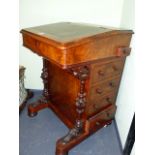 A VICTORIAN WALNUT DAVENPORT DESK. W.53cms.