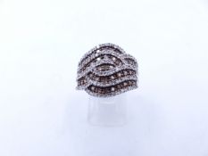 A PAVE SET DIAMOND AND MULTI STONE LARGE SILVER SET DRESS RING, FINGER SIZE Q.