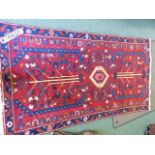 A PERSIAN HAMADAN RUG. 207 x 108cms.