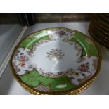 A COALPORT PART DINNER SERVICE, EACH PIECE WITH GILDED RIM, APPLE GREEN BAT SHAPED PANELS WITH