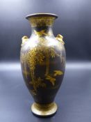 A JAPANESE SATSUMA BALUSTER VASE BY YAKI HODODA WITH GILT BIRD AND WISTERIA DECORATION SIGNED IN