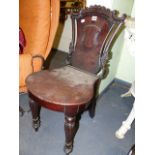 AN EARLY VICTORIAN MAHOGANY HALL CHAIR.