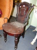 AN EARLY VICTORIAN MAHOGANY HALL CHAIR.