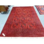 AN AFGHAN BOKHARA CARPET. 262 x 197cms.