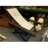 A LATE 19th.C.FOLDING CAMPAIGN OR PLANTATION CHAIR.