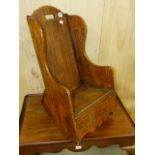 AN 18th.C.COUNTRY OAK CHILD'S ROCKING CHAIR.