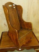 AN 18th.C.COUNTRY OAK CHILD'S ROCKING CHAIR.