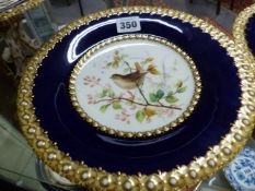 FOUR LATE 19th.C. ENGLISH PORCELAIN TAZZAS PAINTED WITH BLUE TITS, CHAFFINCH AND TWO SONG BIRDS ON