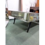 A CONTEMPORARY ART DECO STYLE MIRRORED COFFEE TABLE. 120 x 80cms.